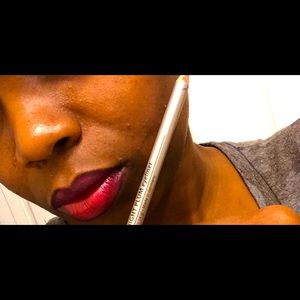 Lipstick and eye pencil. Fall season is here